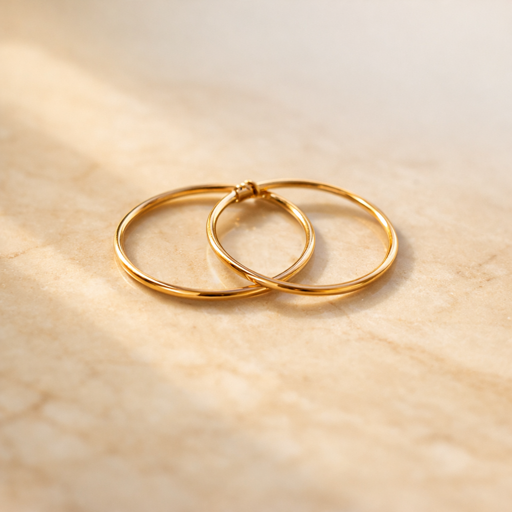 The Aurora Hoops minimalist gold earrings by GOLDÈRE